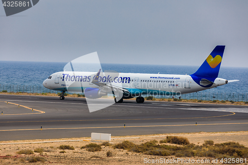 Image of ARECIFE, SPAIN - APRIL, 16 2017: AirBus A321 of ThomasCook.com w