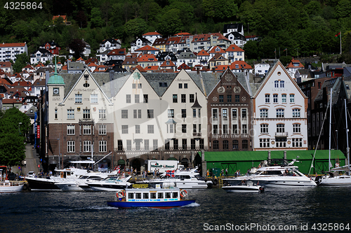 Image of BERGEN HARBOR, NORWAY - MAY 27, 2017: Private boats on a row alo