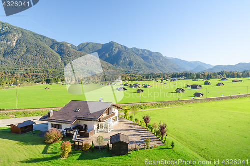 Image of Landscape of Alpine pasture land in valley