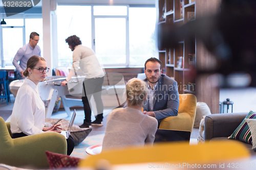 Image of Startup Business Team At A Meeting at modern office building