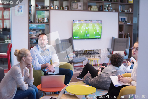 Image of Startup Business Team At A Meeting at modern office building