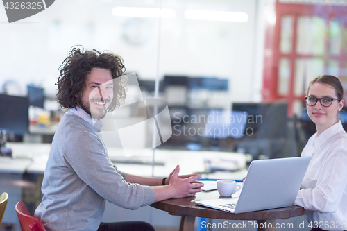 Image of startup Business team Working With laptop in creative office