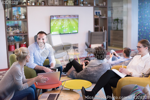 Image of Startup Business Team At A Meeting at modern office building