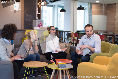 Image of Startup Business Team At A Meeting at modern office building