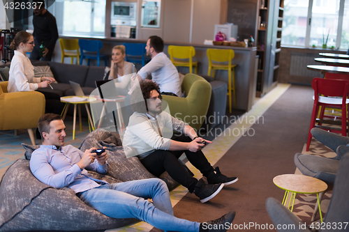 Image of startup Office Workers Playing computer games