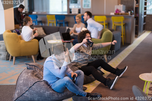 Image of startup Office Workers Playing computer games