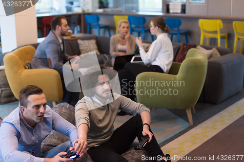 Image of startup Office Workers Playing computer games