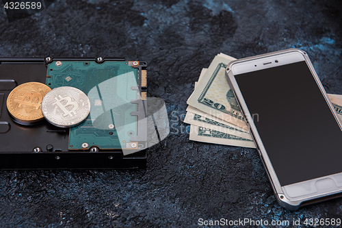 Image of Bitcoin coin with HDD