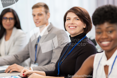 Image of happy business team at international conference