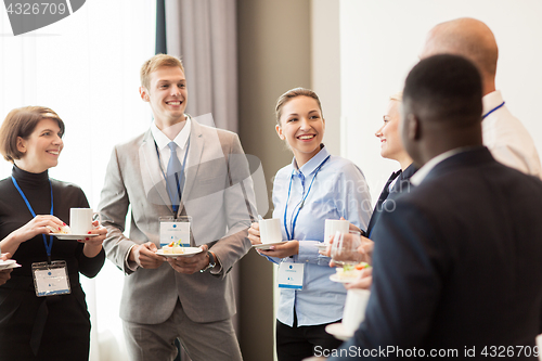 Image of happy business team at international conference