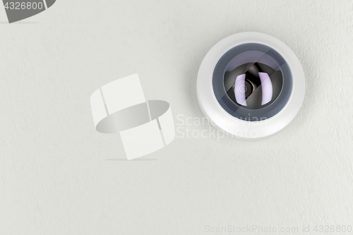 Image of CCTV camera on white ceiling 