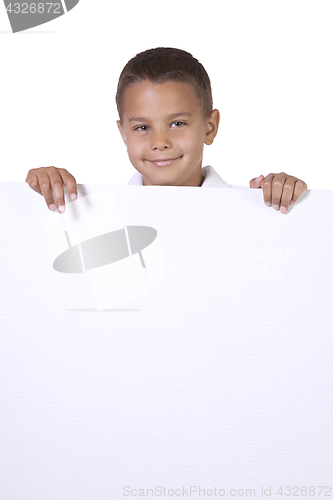 Image of Cute little boy holding a blank sign