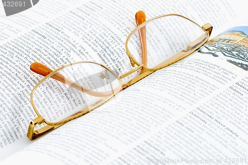 Image of Glasses on a Book