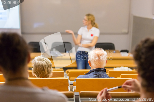 Image of Instructor teaching first aid cardiopulmonary resuscitation workshop.