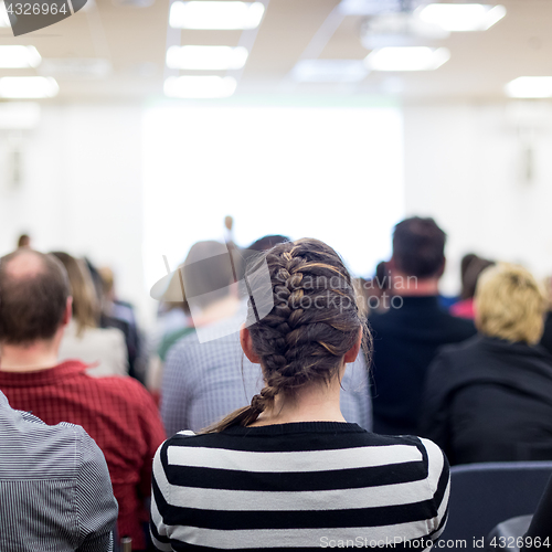 Image of Woman giving presentation on business conference.