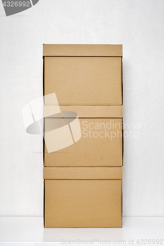 Image of Three cardboard boxes