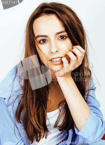 Image of young pretty teenage hipster girl posing emotional happy smiling on white background, lifestyle people concept 