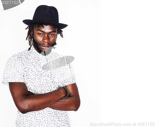 Image of young handsome afro american boy in stylish hipster hat gesturin