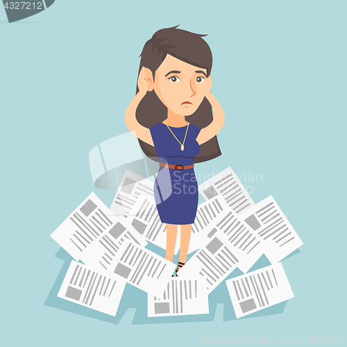 Image of Stressed business woman having lots of work to do.