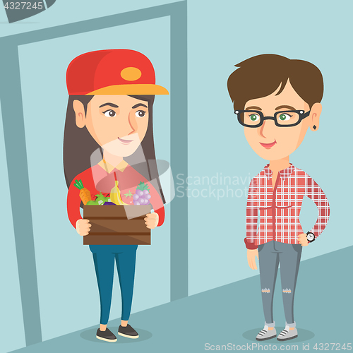 Image of Delivery courier delivering groceries to customer.