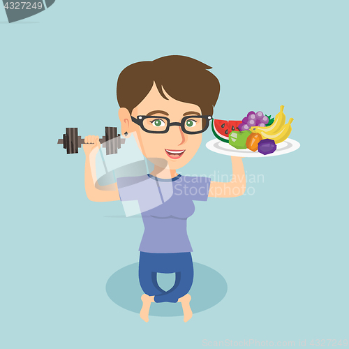 Image of Young caucasian woman with fruits and dumbbell.