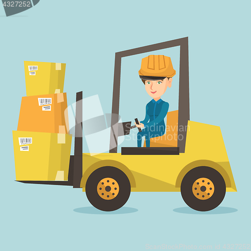 Image of Warehouse worker moving load by forklift truck.