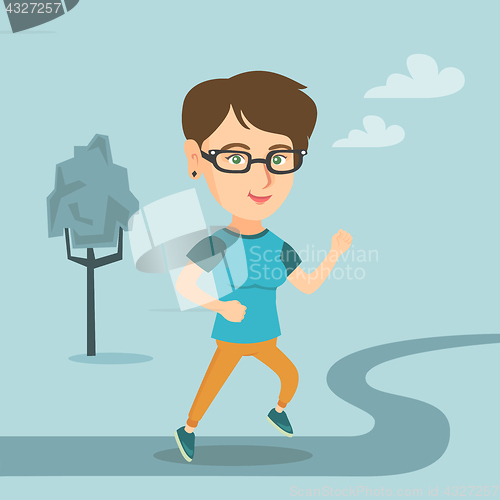Image of Young caucasian woman running in the park.