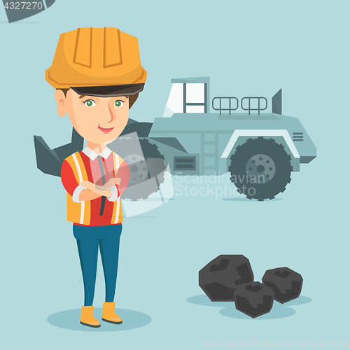 Image of Miner standing on the background of an excavator.