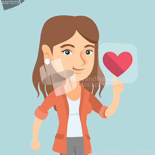 Image of Young caucasian woman pressing heart shaped button