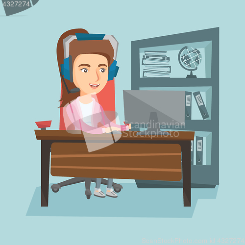 Image of Business woman with headset working in the office.