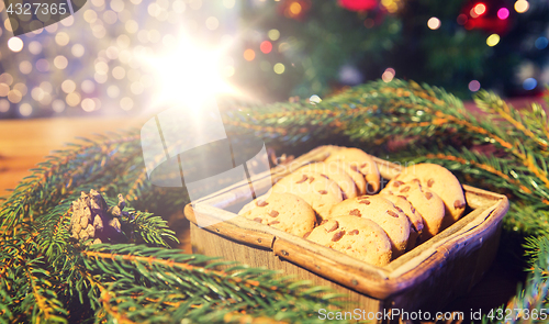 Image of natural green fir christmas wreath and oat cookies