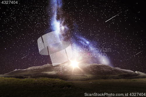 Image of mountain landscape over night sky or space