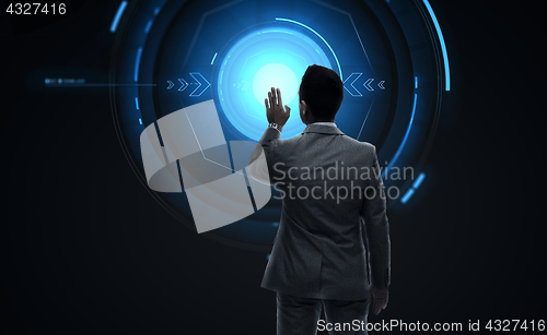 Image of businessman working with virtual reality screen