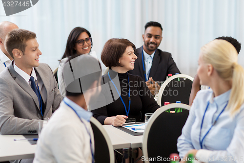 Image of happy business team at international conference