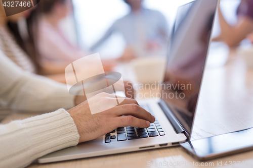 Image of Startup Business Team At A Meeting at modern office building