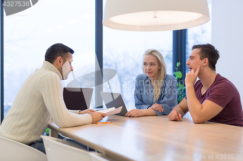 Image of Startup Business Team At A Meeting at modern office building