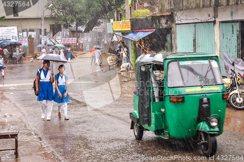 Image of Walking in rain in Bangladesh