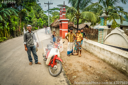 Image of Boys with motorcycle in Bangladesh