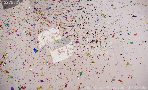 Image of romantic young  couple celebrating  party with confetti