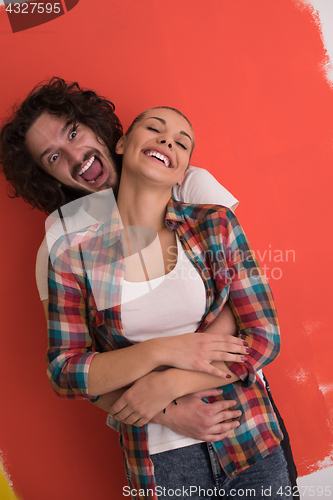 Image of couple in love  over color background