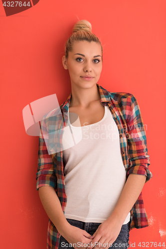 Image of young woman over color background