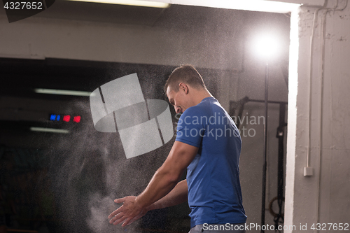 Image of Gym Chalk Magnesium Carbonate hands clapping man