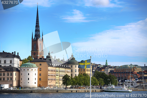 Image of STOCKHOLM, SWEDEN - AUGUST 20, 2016: Tourists boat and View of G