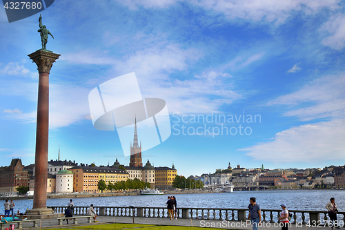 Image of STOCKHOLM, SWEDEN - AUGUST 20, 2016: Tourists walk and visit Sto