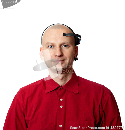 Image of Portrait of young man with EEG (electroencephalography) headset 