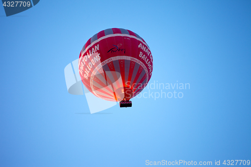 Image of Hot air balloon on blue clear sunlight sky