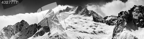 Image of Black and white panorama of snow maintain at winter