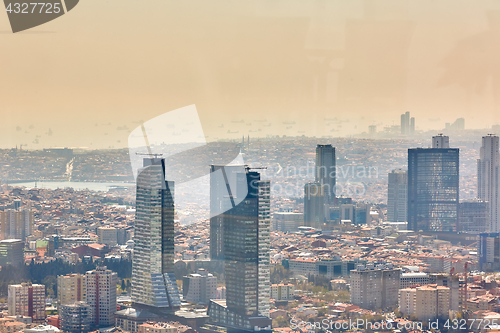 Image of Istanbul, Turkey - 1 April, 2017: Urban landscape of European side of Istanbul and Bosphorus Strait on a horizon. Modern part of city with business towers of international corporations, skyscrapers an