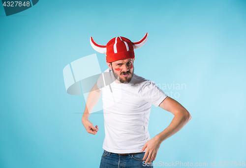 Image of The football fan over blue