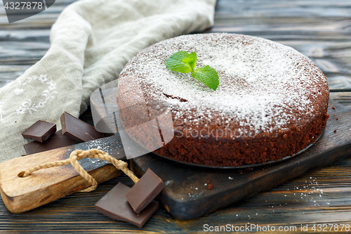 Image of Delicious chocolate cake,dusted with powdered sugar.